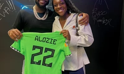 Super Falcons Sensation Michelle Alozie Presents Custom Jersey to Music Icon Davido